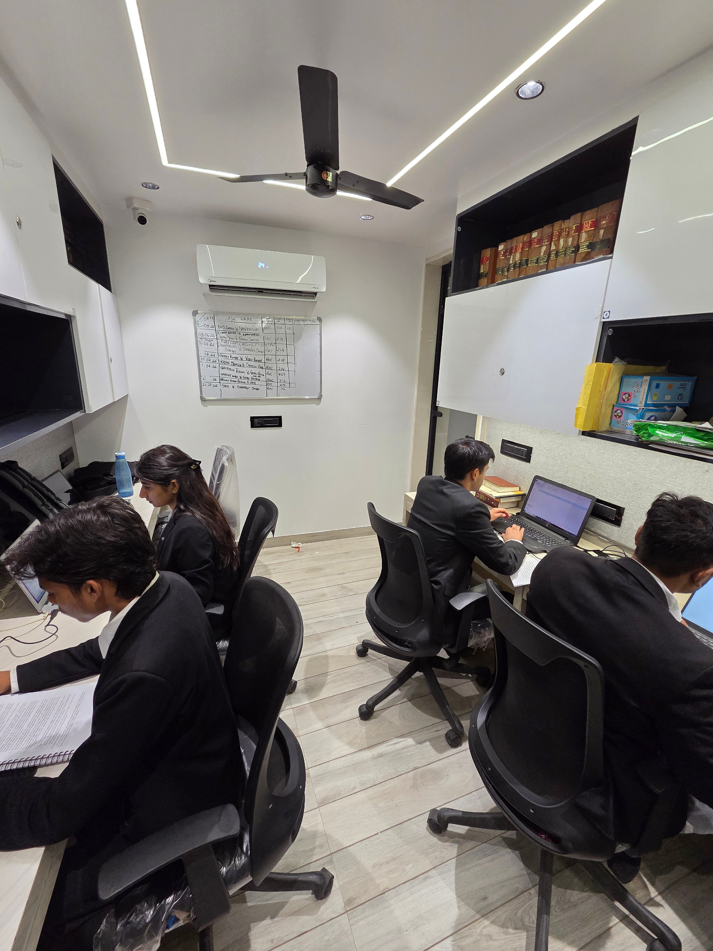 Samvid Law Chambers team reviewing case files